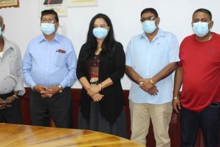 From left are Phillip Rose, Chairperson of New Amsterdam/Berbice River board, Thakoor Persaud, Chairperson East Central Corentyne board, Bhupal Jagroo, Chairperson of Lower Corentyne - Canje board, Minister of Human Services and Social Security, Vindhya Persaud, Regional Chairman David Armogan, Regional Vice Chairman Zamal Hussain, and Regional Executive Officer Narindra Persaud.

