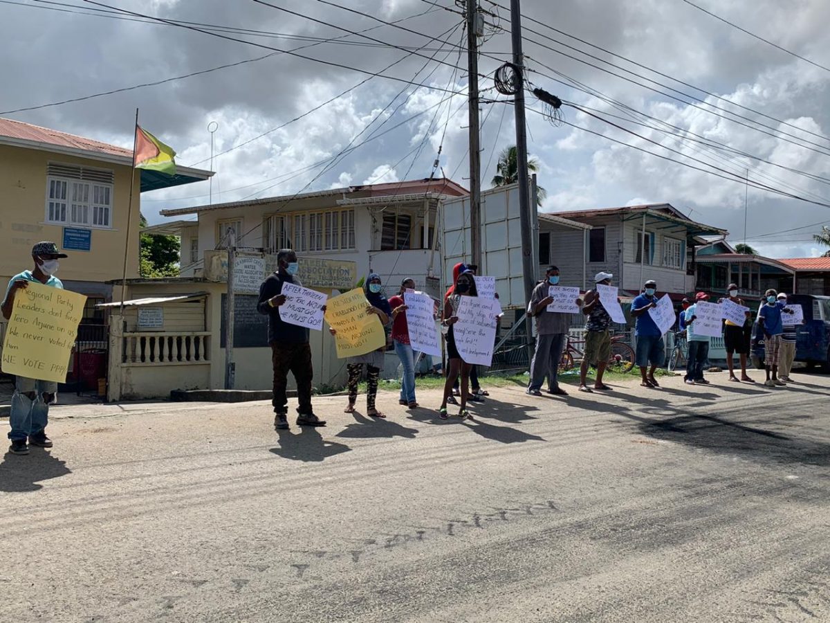 The protesters yesterday across the street from the NDC’s office 