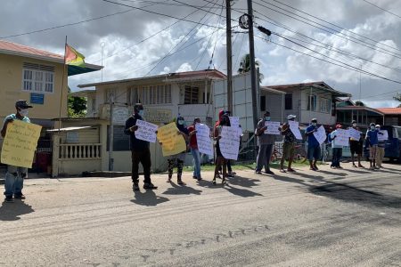The protesters yesterday across the street from the NDC’s office 