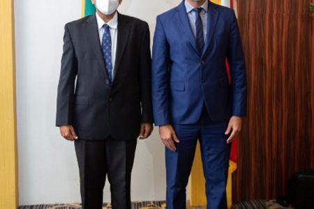 Minister of Health Dr Frank Anthony with Suriname’s Minister of Public Health Amar Ramadhin during the latter’s visit to Guyana in October 2020 (Department of Public Information photo)
