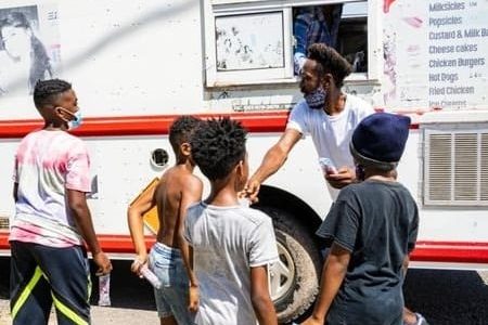 Children receiving free ice cream