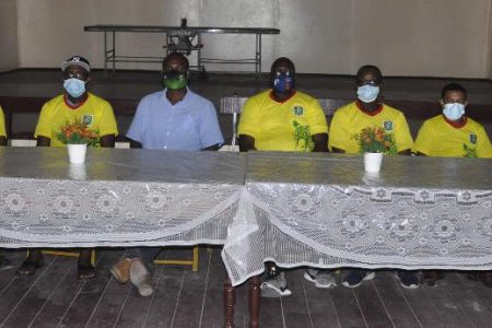 Guyana Football federation (GFF) president Wayne Forde, fourth from left, with members of the Kwakwani Ad Hoc Committee.
