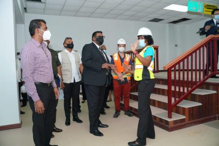 President Irfaan Ali (centre) during a tour of the airport project on September 21 this year