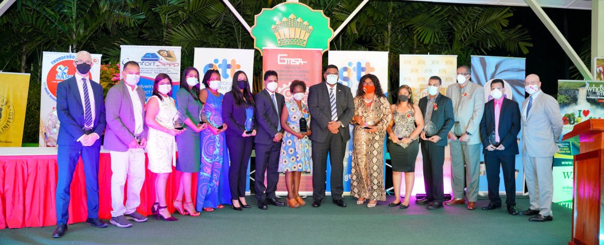 President Irfaan Ali (centre) flanked by GSMA awardees (Office of the President photo)
