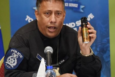 Gary Griffith with a can of pepper spray