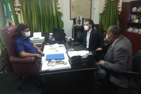 The team in a meeting with the Mayor of Georgetown Ubraj Narine (left) 