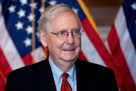 FILE PHOTO: U.S. Senate Majority Leader Mitch McConnell, a Republican from Kentucky, stands for a photo at the U.S. Capitol in Washington, D.C., U.S., November 9, 2020. Stefani Reynolds/Pool via REUTERS/File Photo