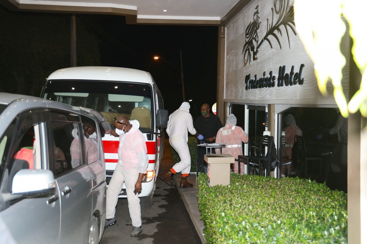Perenco employees who tested negative for COVID-19 check into the Tradewinds Hotel in San Fernando on Monday night. Over 50 of their co-workers who tested positive for the virus are now in quarantine at the University of the West Indies’ Debe campus.
