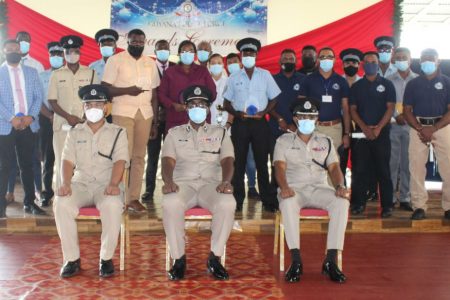 Commissioner of Police (ag) Nigel Hoppie (seated at centre), Deputy Commissioner ‘Operations’ (ag) Clifton Hicken (seated at right) and Deputy Commissioner ‘Administration’ (ag) Calvin Brutus (seated at left) posed with the awardees. (Guyana Police Force photo)