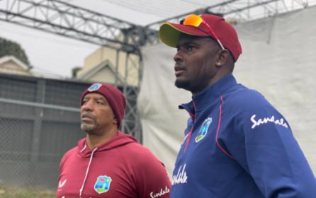 WELLINGTON ON THEIR MINDS: West Indies captain Jason Holder (right) and head coach Phil Simmons look on during a training session.