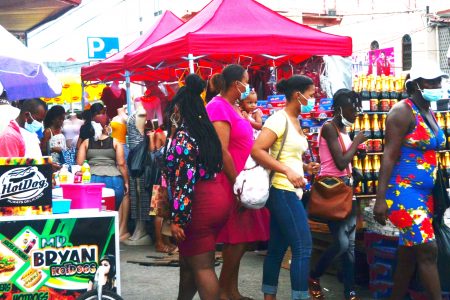Seasonal hustle and bustle: Shopping in earnest on Regent Street yesterday (Orlando Charles photo)