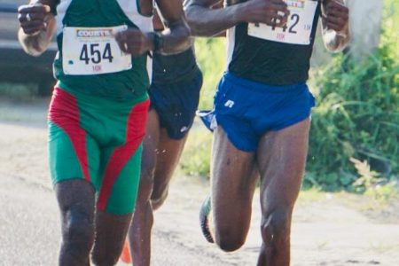 Local elite long distance athletes, Cleveland Thomas, Winston Missigher and Cleveland Forde will be among the front runners vying for spots on the podium on Sunday when the AAG stages its leg of the South American 10km road race. (Emmerson Campbell photo) 
