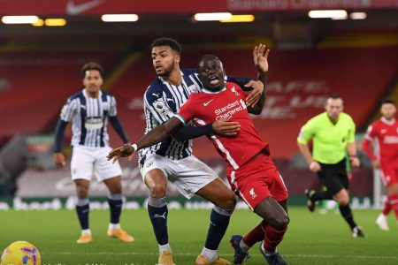 Liverpool’s Sadio Mane in action with West Bromwich Albion’s Darnell Furlong Pool via REUTERS/Stu Forster
