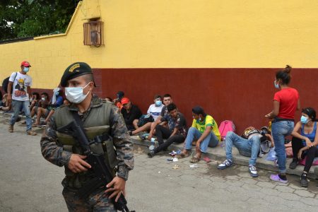 A Guatemalan soldier patrols to prevent a group of Honduran migrants who are trying to reach the U.S. , from moving towards the Guatemala and Mexico border, as they sit outside the migrant shelter, in Tecun Uman, Guatemala October 3, 2020. (REUTERS/Jose Torres file photo)
