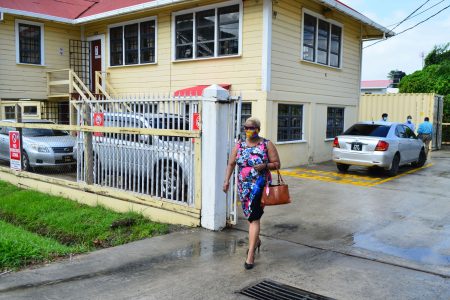 Volda Lawrence leaving the SOCU office located on Camp Road yesterday morning 