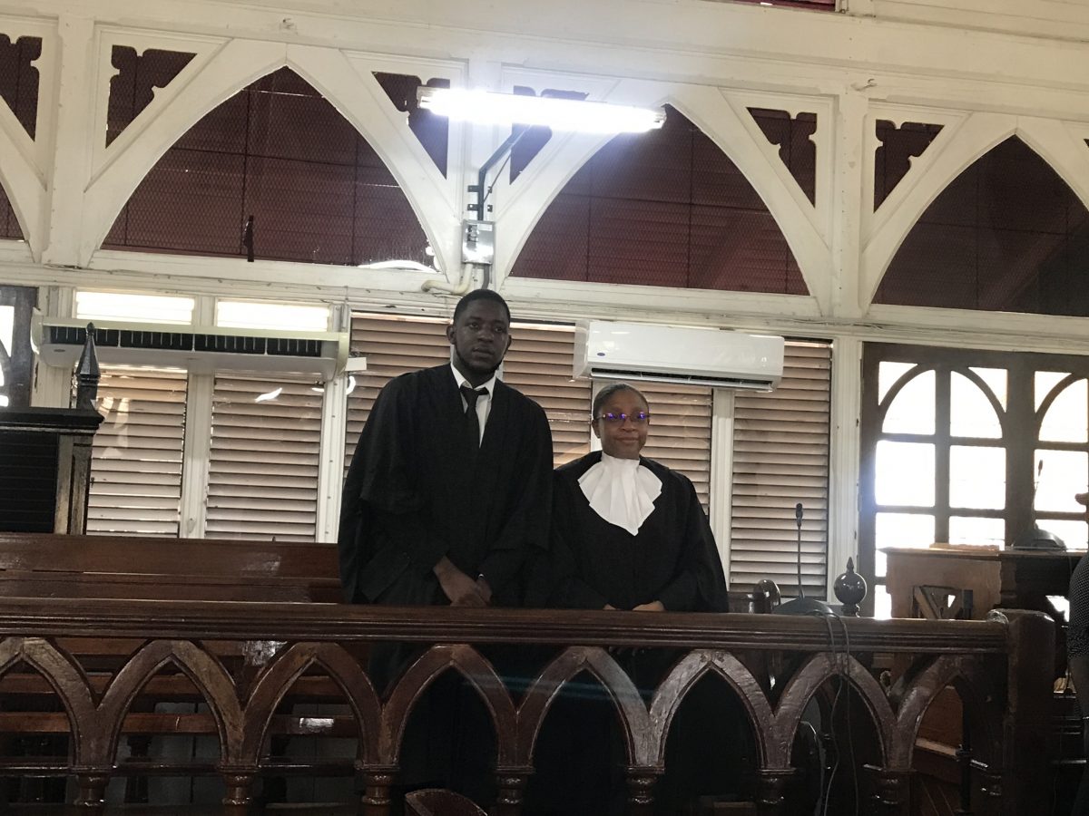 Jamaal Duff, who was admitted to the bar on Wednesday is seen here with Chief Justice (Ag) Roxane George-Wiltshire just after his petition was presented.