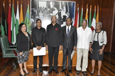 From left are Carol Corbin, Sukrishnalall Pasha, then President David Granger, Ivor English, Nanda Kishore Gopaul and Emily Dodson after the swearing in ceremony in 2016 (Ministry of the Presidency photo)