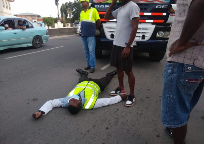 Injured Constable Roy Shanks lying on the roadway