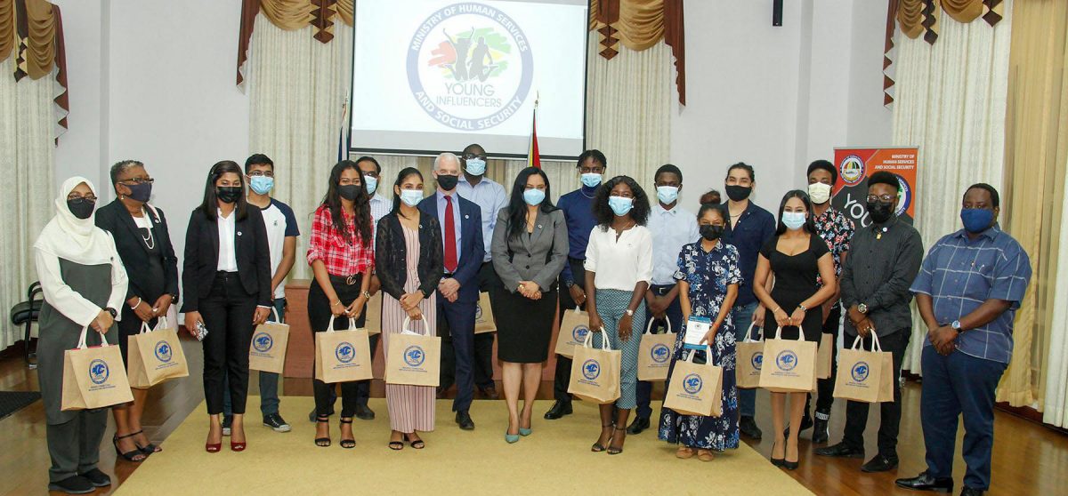 The Ministry of Human Services and Social Security on Thursday evening  launched its ‘Young Influencers’ programme to prepare youths to make a difference within their communities and among their peers. In photo are some of the programme participants with officials. (Human Services Ministry photo) 