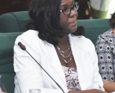 Abena Moore at the hearing (Department of Public Information photo)