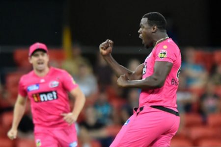 All-rounder Carlos Brathwaite celebrates one of his four wickets against Heat on Sunday. 