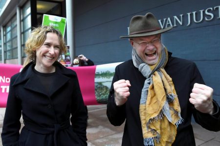 Channa Samkalden, lawyer of Nigerian farmers and Milieudefensie, and Donald Pols, Director of Milieudefensie, react as they leave a Dutch appeals court after the verdict in a case over oil major Shell's responsibility for oil pollution in the Niger Delta, in the Hague, Netherlands January 29, 2021. REUTERS/Piroschka Van De Wouw