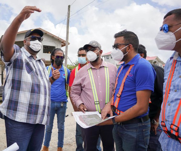 President Irfaan Ali (left) visiting the site of the East Bank project today. (Office of the President photo)