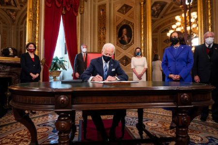 President Joe Biden signs three documents including an Inauguration declaration, cabinet nominations and sub-cabinet nominations, in the Presidents Room at the U.S. Capitol after the inauguration Jim Lo Scalzo/Pool