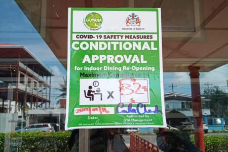 The sign indicating approval for indoor dining (Guyana Tourism Authority photo) 