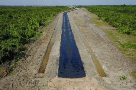 An aerial view of a section of the new road under preparation for the laying of asphalt (Office of the President photo)