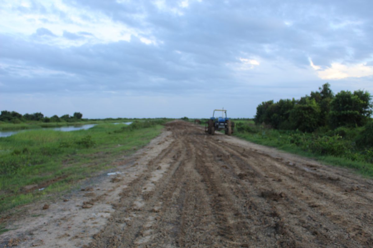 The dirt road currently being used by farmers