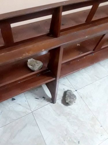 Two of the stones that church members found inside the building.
