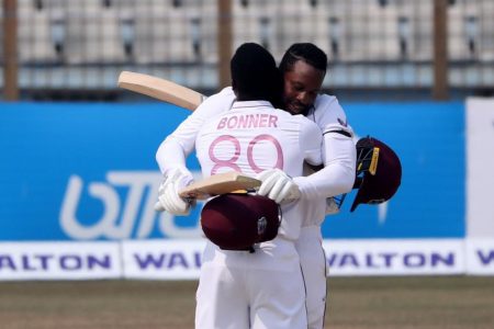 FLASHBACK! Nkrumah Bonner and Kyle Mayers, architects of the famous first test win against Bangladesh at Chattogram, embrace during their partnership. (Photo courtesy of Cricket West Indies)
