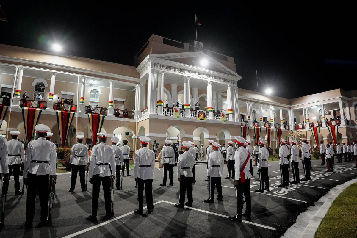 Ceremonially garbed members of the Joint Services arrayed last evening for the flag raising ceremony in the compound of Parliament Buildings to commemorate the 51st anniversary of Guyana’s Republican status. (Office of the President photo)
