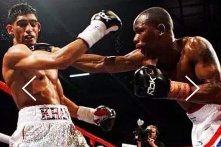 FLASHBACK! Guyana’s Gairy St Clair in action against Amir Khan.