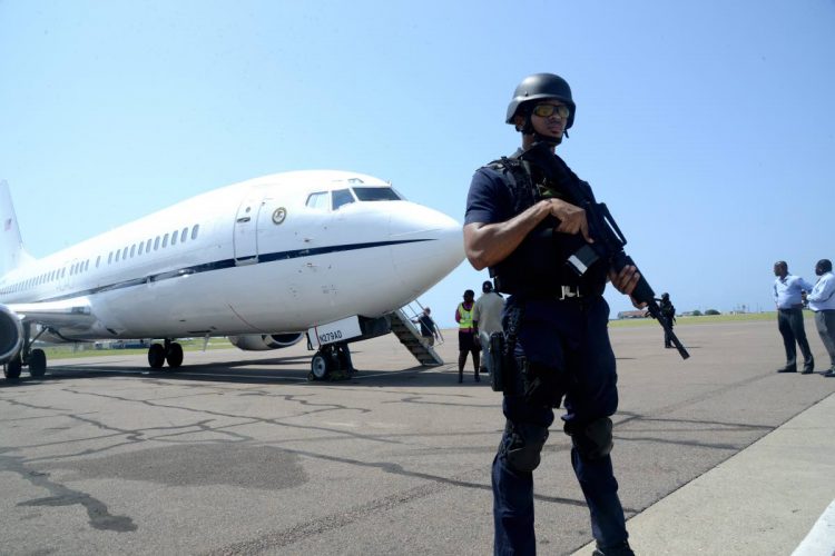 A policeman is seen monitoring an extradition exercise at the Norman Manley International Airport in this April 2017 photograph. A Jamaican man was extradited to the United States in January 2021 after more than 20 years on the run.
