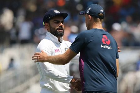 England captain Joe Root congratulates his opposite number Virat Kohli following the match.
