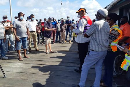 Minister of Public Works Juan Edghill meeting with residents (Ministry of Public Works photo)