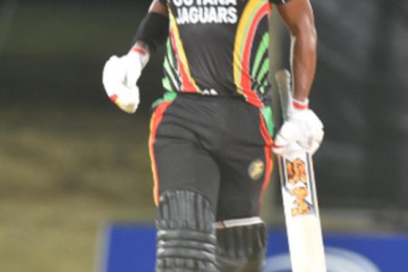 Leon Johnson hobbles down the pitch as he celebrates his hundred against Leeward Islands Hurricanes last night. (Photo courtesy CWI Media) 