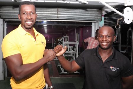 Paul Meusa (left) with friend and longtime trainer, Omar Hope have teamed up to manage the new fitness establishment, Exodus Gym.