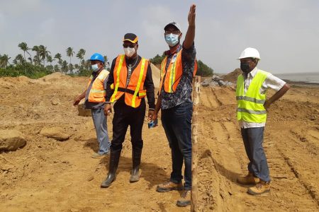 Minister of Public Works, Juan Edghill (second from left) inspecting sea and river defence works at #60 Village, Corentyne yesterday. (Ministry of Public Works photo)
