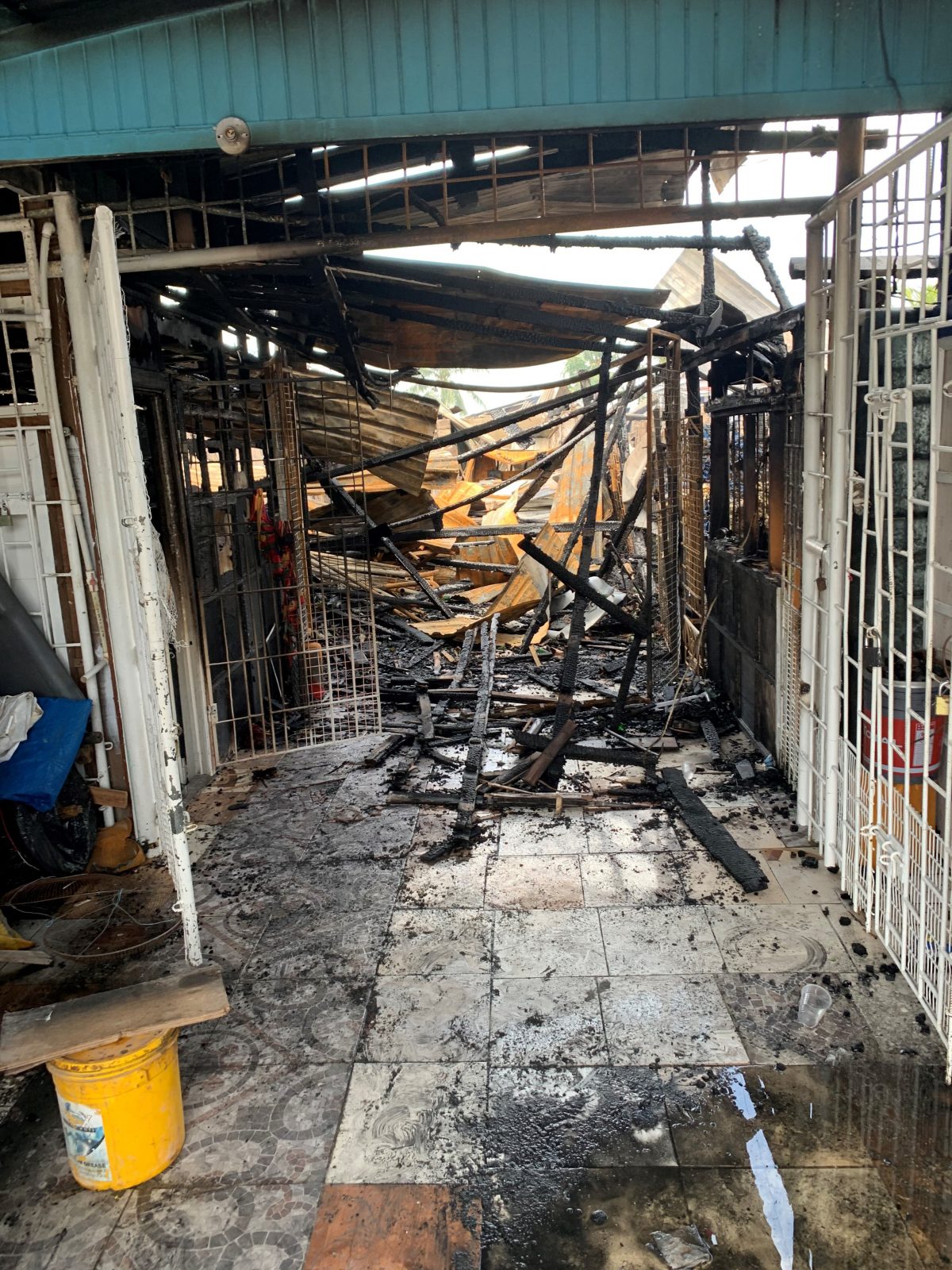 The entrance to one of the business establishments gutted by the fire 
