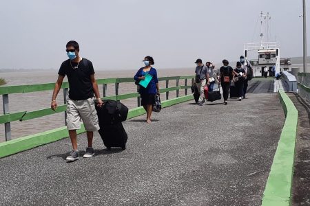 Passengers disembarking from the MB Sandaka today (Ministry of Public Works photo)