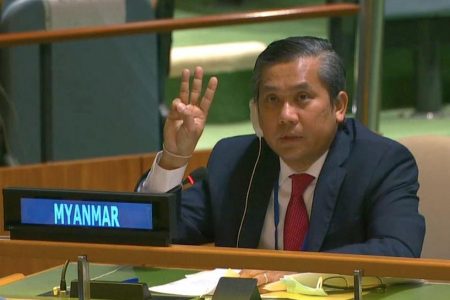 Myanmar's ambassador to the United Nations Kyaw Moe Tun holds up three fingers at the end of his speech to the General Assembly where he pleaded for International action in overturning the military coup in his country as seen in this still image taken from a video, in the Manhattan borough of New York City, New York, U.S., February 26, 2021. United Nations TV/Handout via REUTERS