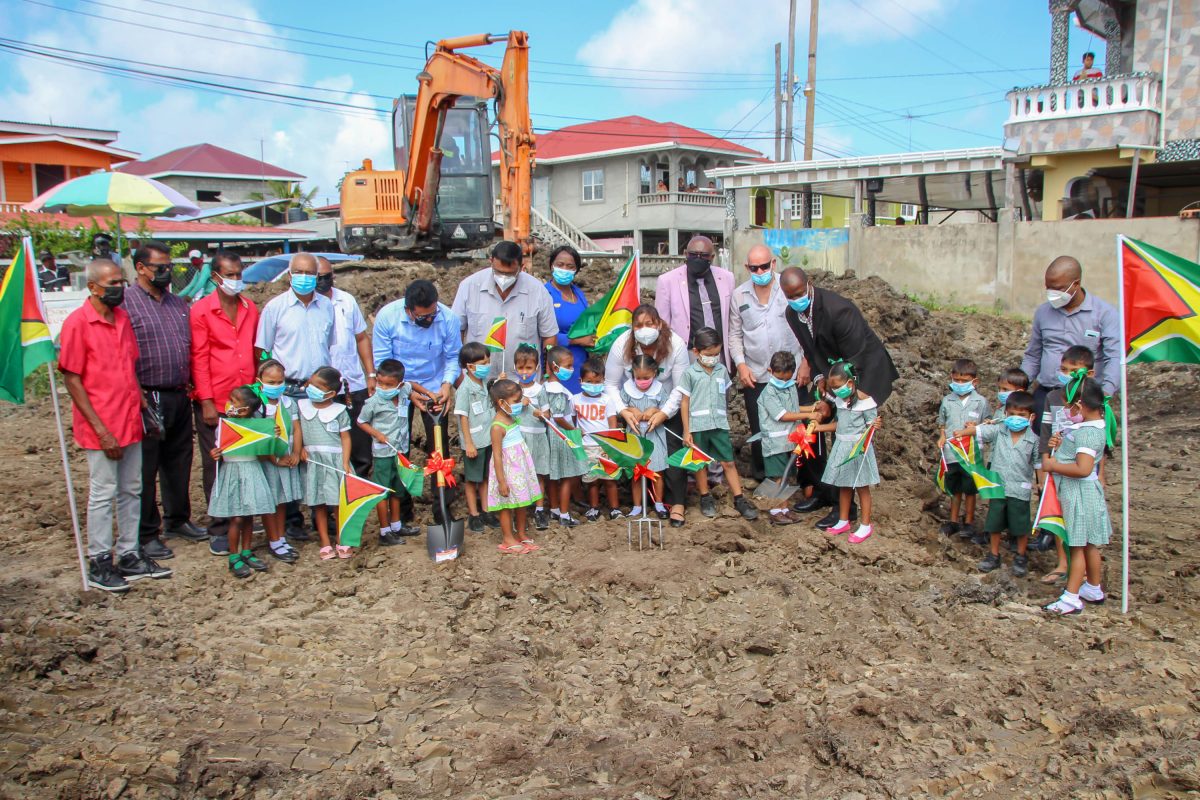 The sod being turned yesterday for the new school. (Ministry of Education photo)