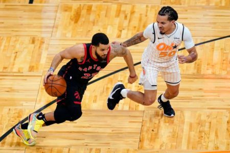 Fred Van Vleet goes around Orlando Magic’s Cole Anthony during his 54 point effort.