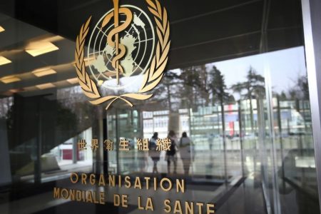 FILE PHOTO: A logo is pictured outside a building of the World Health Organization (WHO) during an executive board meeting on update on the coronavirus outbreak, in Geneva, Switzerland, February 6, 2020. REUTERS/Denis Balibouse