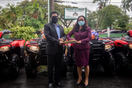 Senior Minister in the Office of the President with responsibility for Finance, Hon Dr Ashni Singh and Minister of Amerindian Affairs, Hon Pauline Sukhai at the handing over ceremony (Ministry of Finance photo) 