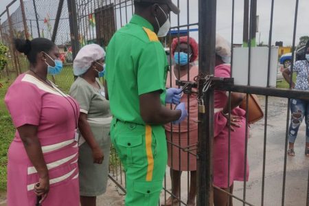 The chained hospital gates as nurses stood outside