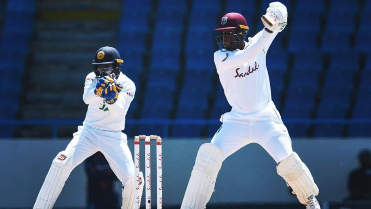 Nkrumah Bonner of West Indies hitting a boundary against Sri Lanka on his to a hundred on the 5th and final day of the 1st Test at Vivian Richards Cricket Stadium in North Sound, Antigua and Barbuda (Photo courtesy Trinidad and Tobago Newsday)